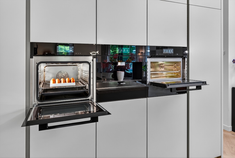 FotoEén geheel in maatwerk in een licht penthouse in Rosmalen